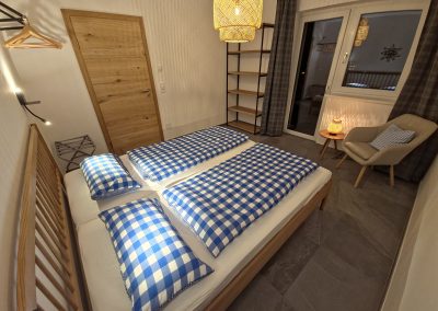 Schlafzimmer des Blauen Apartments im Almblick